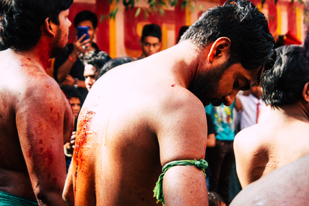 Varanasi India November 17, 2018 View of unknowns Shiite  Muslims use chains and blades during ritual self flagellation as part of the Imam Husain celebration,のeditorial素材