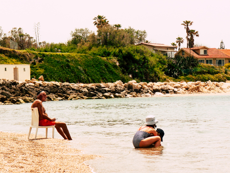 Sdot Yam Israel April 27, 2019 View of unknowns people having fun in the beach of Sdot Yam kibbutz at the Haifa district in the afternoonのeditorial素材