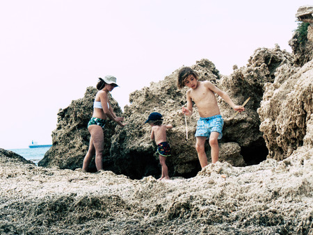 Sdot Yam Israel April 27, 2019 View of unknowns kid having fun in the beach of Sdot Yam kibbutz at the Haifa district in the afternoonのeditorial素材