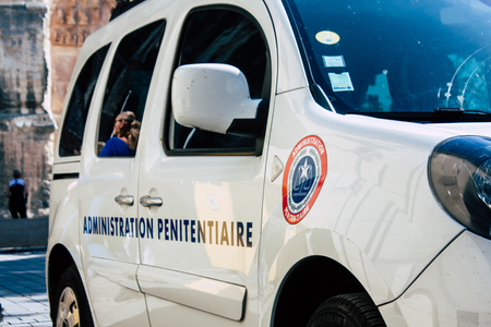 Reims France April 21, 2019 Closeup of a white police car of the penitentiary administration parked...