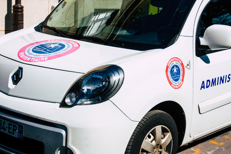 Reims France April 21, 2019 Closeup of a white police car of the penitentiary administration parked...