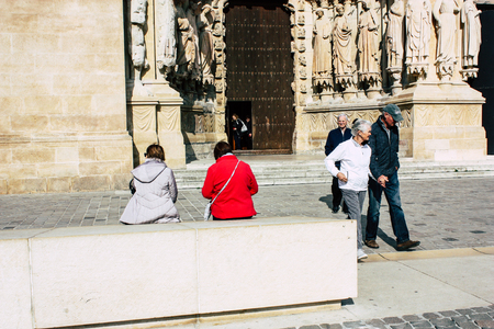 Reims France April 21, 2019 View of unknowns tourist walking on the forecourt of the Notre Dame de Reims Cathedral in the afternoonのeditorial素材