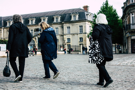 Reims France April 21, 2019 View of unknowns tourist walking on the forecourt of the Notre Dame de Reims Cathedral in the afternoonのeditorial素材