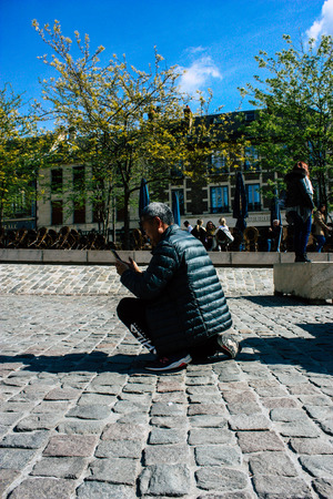 Reims France April 21, 2019 View of unknowns tourist walking on the forecourt of the Notre Dame de Reims Cathedral in the afternoonのeditorial素材