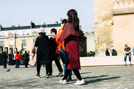 Reims France April 21, 2019 View of unknowns tourist walking on the forecourt of the Notre Dame de Reims Cathedral in the afternoonのeditorial素材