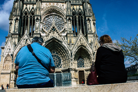 Reims France April 21, 2019 View of unknowns tourist walking on the forecourt of the Notre Dame de...