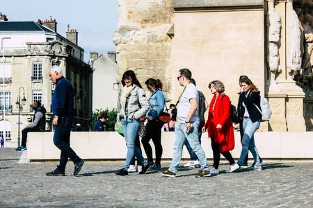Reims France April 21, 2019 View of unknowns tourist walking on the forecourt of the Notre Dame de Reims Cathedral in the afternoonのeditorial素材