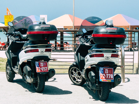 Tel Aviv Israel April 29, 2019  View of a Israeli police motorcycle parked in the street front the beach of Tel Aviv in the afternoonのeditorial素材