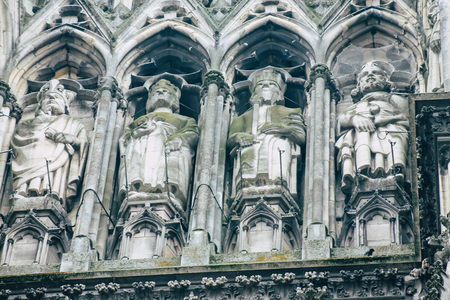Reims France May 3, 2019 Closeup of the statues on the exterior facade of the Notre Dame de Reims cathedral in the morningの写真素材