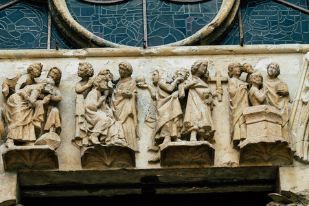Reims France May 3, 2019 Closeup of the statues on the exterior facade of the Notre Dame de Reims cathedral in the morningの写真素材