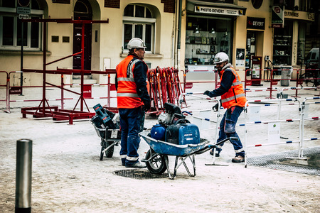 Reims France May 3, 2019 View of unknown people working on the new square of the Reims City Hall in...