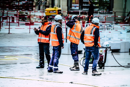 Reims France May 3, 2019 View of unknown people working on the new square of the Reims City Hall in...