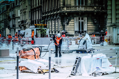 Reims France May 3, 2019 View of unknown people working on the new square of the Reims City Hall in the morningのeditorial素材