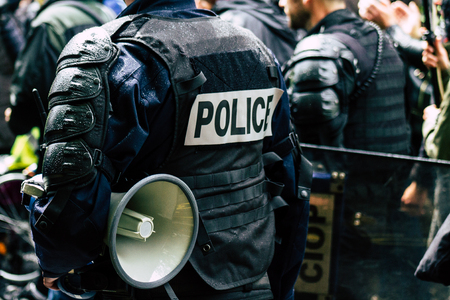 Paris France May 04, 2019 View of a riot squad of the French National Police in intervention during protests of the Yellow Jackets against the policy of President Macron in Paris on saturday afternoonのeditorial素材