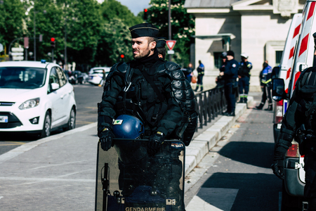 Paris France May 04, 2019 View of a riot squad of the French National Police in intervention during protests of the Yellow Jackets against the policy of President Macron in Paris on saturday afternoonのeditorial素材