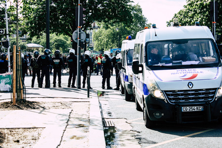 Paris France May 04, 2019 View of a riot squad of the French National Police in intervention during protests of the Yellow Jackets against the policy of President Macron in Paris on saturday afternoonのeditorial素材