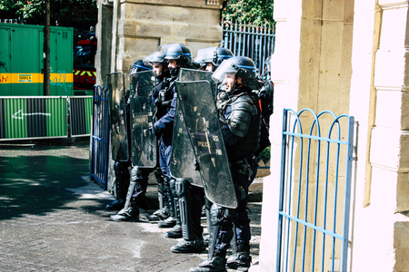 Paris France May 04, 2019 View of a riot squad of the French National Police in intervention during protests of the Yellow Jackets against the policy of President Macron in Paris on saturday afternoonのeditorial素材