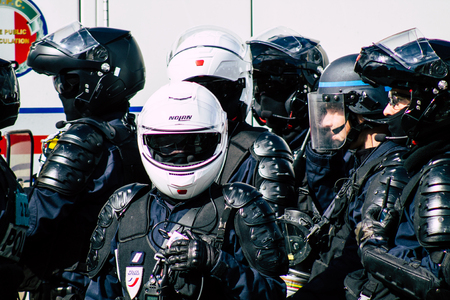 Paris France May 04, 2019 View of a riot squad of the French National Police in intervention during protests of the Yellow Jackets against the policy of President Macron in Paris on saturday afternoonのeditorial素材