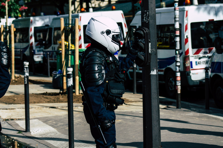 Paris France May 04, 2019 View of a riot squad of the French National Police in intervention during protests of the Yellow Jackets against the policy of President Macron in Paris on saturday afternoonのeditorial素材