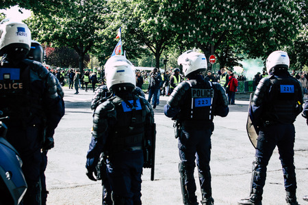 Paris France May 04, 2019 View of a riot squad of the French National Police in intervention during protests of the Yellow Jackets against the policy of President Macron in Paris on saturday afternoonのeditorial素材