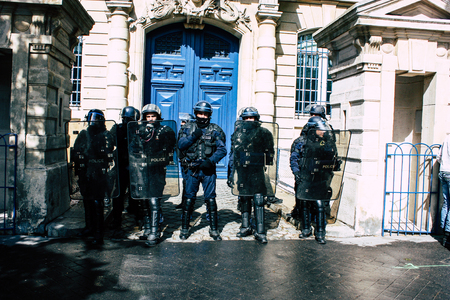 Paris France May 04, 2019 View of a riot squad of the French National Police in intervention during protests of the Yellow Jackets against the policy of President Macron in Paris on saturday afternoonのeditorial素材
