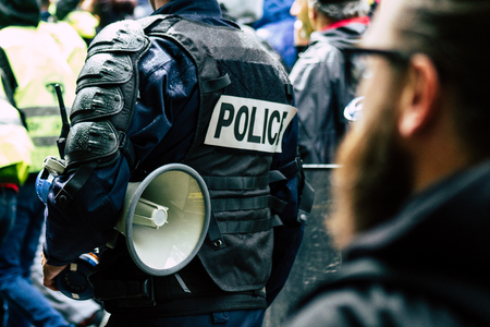 Paris France May 04, 2019 View of a riot squad of the French National Police in intervention during protests of the Yellow Jackets against the policy of President Macron in Paris on saturday afternoonのeditorial素材