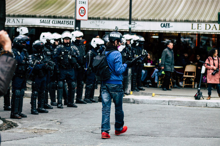 Paris France May 04, 2019 View of press journalist covering protests of the Yellow Jackets against the policy of President Macron in Paris on saturday afternoonのeditorial素材