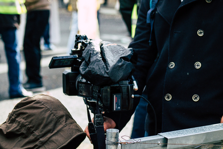 Paris France May 04, 2019 View of press journalist covering protests of the Yellow Jackets against the policy of President Macron in Paris on saturday afternoonのeditorial素材