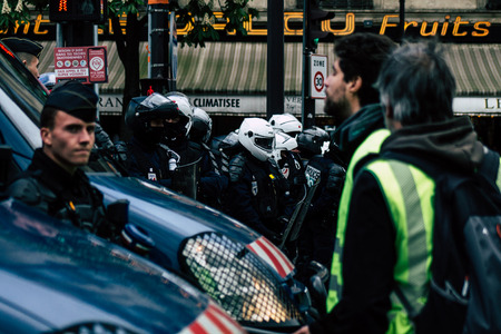 Paris France May 04, 2019 View of press journalist covering protests of the Yellow Jackets against the policy of President Macron in Paris on saturday afternoonのeditorial素材