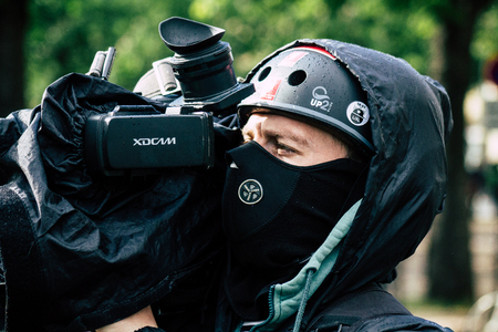 Paris France May 04, 2019 View of press journalist covering protests of the Yellow Jackets against...