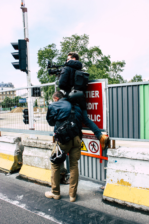 Paris France May 04, 2019 View of press journalist covering protests of the Yellow Jackets against the policy of President Macron in Paris on saturday afternoonのeditorial素材