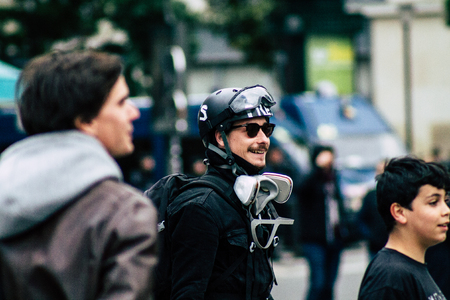 Paris France May 04, 2019 View of press journalist covering protests of the Yellow Jackets against the policy of President Macron in Paris on saturday afternoonのeditorial素材