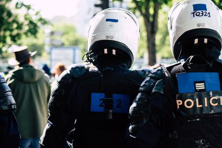 Paris France May 04, 2019 View of a riot squad of the French National Police in intervention during protests of the Yellow Jackets against the policy of President Macron in Paris on saturday afternoonのeditorial素材