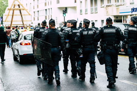 Paris France May 04, 2019 View of a riot squad of the French National Gendarmerie in intervention during protests of the Yellow Jackets against the policy of President Macron in Paris on saturday afternoonのeditorial素材