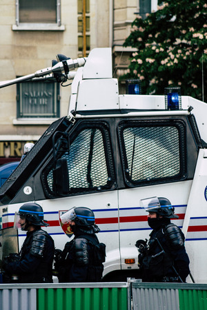 Paris France May 04, 2019 View of a riot squad of the French National Police in intervention during protests of the Yellow Jackets against the policy of President Macron in Paris on saturday afternoonのeditorial素材