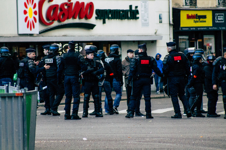 Paris France May 04, 2019 View of a riot squad of the French National Police in intervention during protests of the Yellow Jackets against the policy of President Macron in Paris on saturday afternoonのeditorial素材