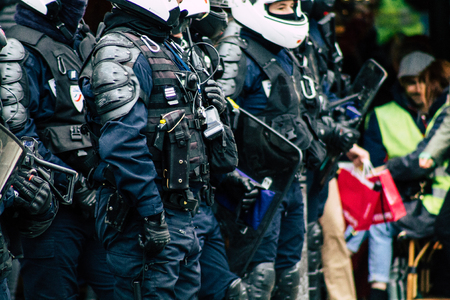 Paris France May 04, 2019 View of a riot squad of the French National Police in intervention during protests of the Yellow Jackets against the policy of President Macron in Paris on saturday afternoonのeditorial素材