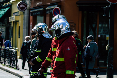 Paris France May 04, 2019 View of a French firefighters walking in the street during protests of the...