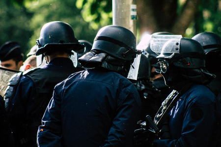 Paris France May 04, 2019 View of a riot squad of the French National Police in intervention during protests of the Yellow Jackets against the policy of President Macron in Paris on saturday afternoonのeditorial素材