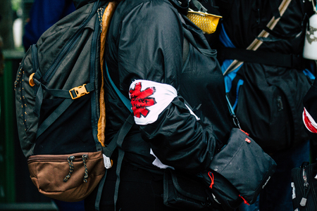 Paris France May 04, 2019 View of French street medic walking in the street during protests of the Yellow jackets against the policy of President Macron in Paris on saturday afternoonのeditorial素材