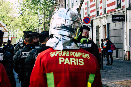 Paris France May 04, 2019 View of a French firefighters walking in the street during protests of the...