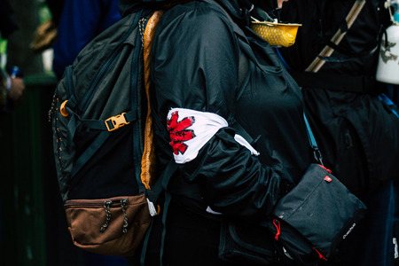Paris France May 04, 2019 View of French street medic walking in the street during protests of the Yellow jackets against the policy of President Macron in Paris on saturday afternoonのeditorial素材