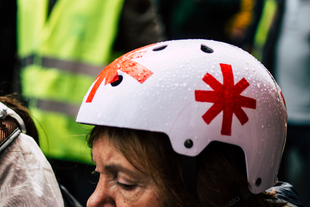 Paris France May 04, 2019 View of French street medic walking in the street during protests of the Yellow jackets against the policy of President Macron in Paris on saturday afternoonのeditorial素材