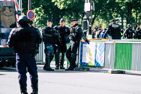 Paris France May 04, 2019 View of a riot squad of the French National Police in intervention during protests of the Yellow Jackets against the policy of President Macron in Paris on saturday afternoonのeditorial素材