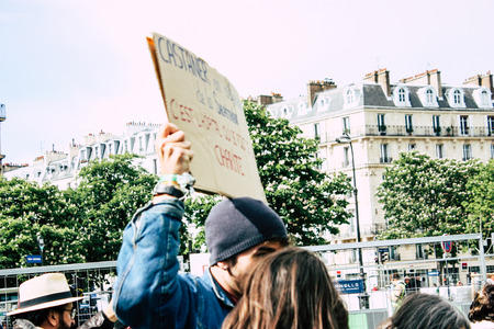 Paris France May 04, 2019 View of Yellow Jackets protesters framed by anti riot police marching against President Macron's policy in Paris on saturday afternoonのeditorial素材