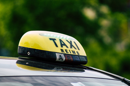 Reims France May 7, 2019 View of a traditional French taxi rolling in the city of Reims in France in the afternoonのeditorial素材