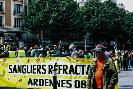 Reims France May 18, 2019 View of unknown Yellow Jackets protesters marching against the policy of President Macron on Saturday afternoonのeditorial素材