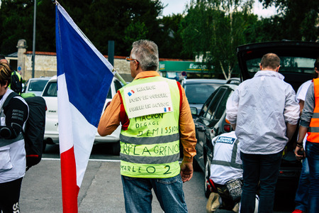 Reims France May 18, 2019 View of unknown Yellow Jackets protesters marching against the policy of President Macron on Saturday afternoonのeditorial素材