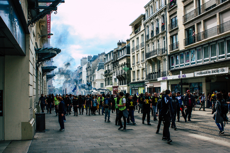 Reims France May 18, 2019 View of unknown Yellow Jackets protesters marching against the policy of President Macron on Saturday afternoonのeditorial素材
