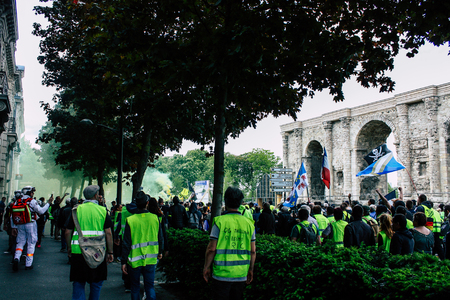 Reims France May 18, 2019 View of unknown Yellow Jackets protesters marching against the policy of President Macron on Saturday afternoonのeditorial素材